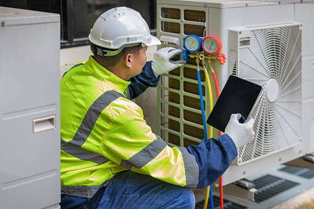 Professional Hvac technician working in Ellendale, ND
